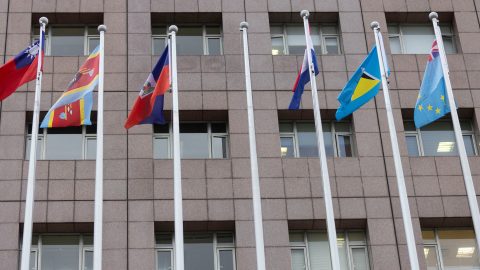 An empty flag pole where Nauru s flag used to fly is pictured next to flags of other countries at the Diplomatic Quarter which houses embassies in Taipei