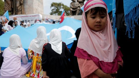 Ethnic Uyghur demonstrators take part in a protest against China in Istanbul