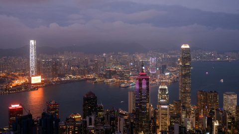 FILE PHOTO: An evening view of the financial Central district and Victoria Harbour in Hong Kong