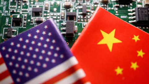 FILE PHOTO: Illustration picture of Chinese and U S flags with semiconductor chips