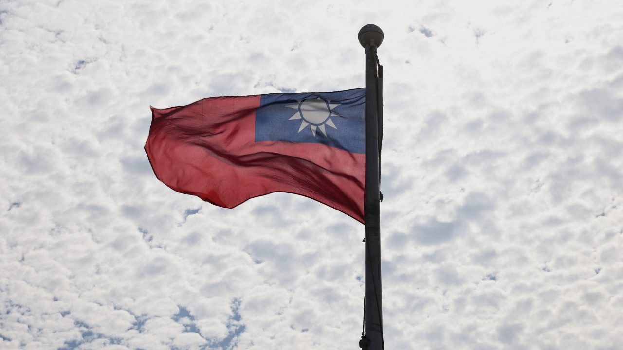 A Taiwanese flag flaps in the wind in Taoyuan
