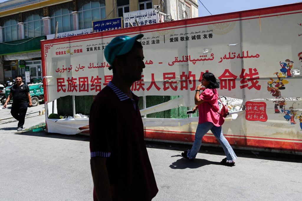 CHINA RIGHTS MINORITIES RELIGION TOURISM