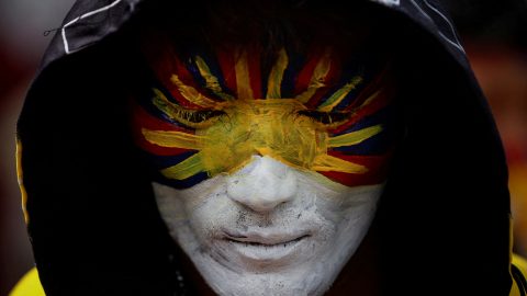Tibetan participate in a march to mark the th anniversary of the uprising in Dharamsala