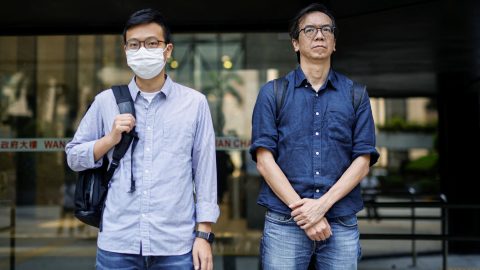 Chung Pui-kuen, left, former chief editor of Stand News, and Patrick Lam, former acting chief editor, were convicted of sedition in Hong Kong as the government continues to crack down on press freedom. (Photo: Tyrone Siu/Reuters)