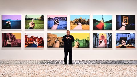Ai Weiwei poses in front of his art pieces at the Design Museum in London on April 4, 2023 during the press preview for the exhibition Ai Weiwei: Making Sense. (Photo: Justin Tallis/AFP)