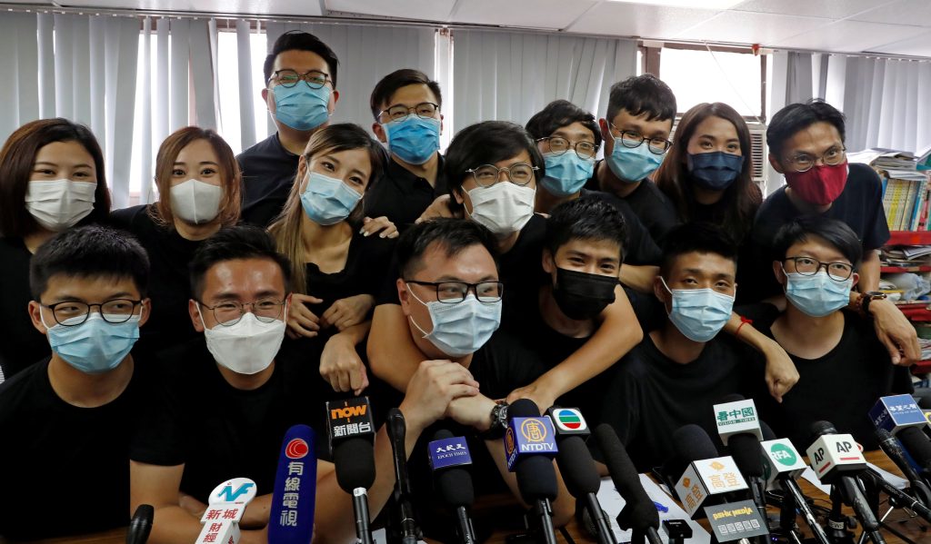 FILE PHOTO: Young Hong Kong democrats from the so called "resistance" or localists camp attend a news conference after pre election in Hong Kong
