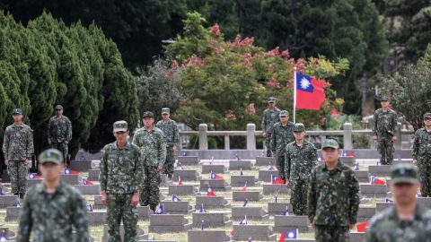 Soldiers stand guard at a public cemetery during a ceremony commemorating the 75th anniversary of the Battle of Guningtou in Kinmen on October 25. (Photo: I-Hwa Cheng/AFP)