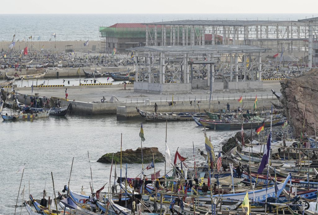 Ghana Accra fishing port GHANA Accra Jamestown old fishing port and behind construction site of new fishing harbour