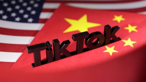 Illustration shows TikTok logo U S and Chinese flags