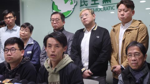 The chairman of the Democratic Party, Lo Kin-hei, and other party members attend a press conference at Democratic Party Headquarters in Hong Kong on February 20. (Photo: Edmond So/Reuters)