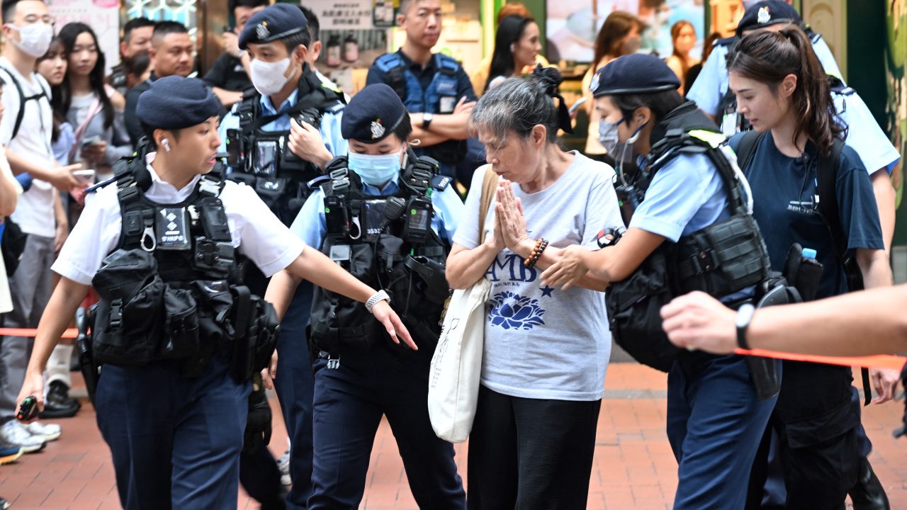 Police detain former activist Lui Yuk-lin close to Victoria Park in Hong Kong’s Causeway Bay district on June 4, the anniversary of China’s Tiananmen Square crackdown. (Photo: by Peter Parks/AFP)