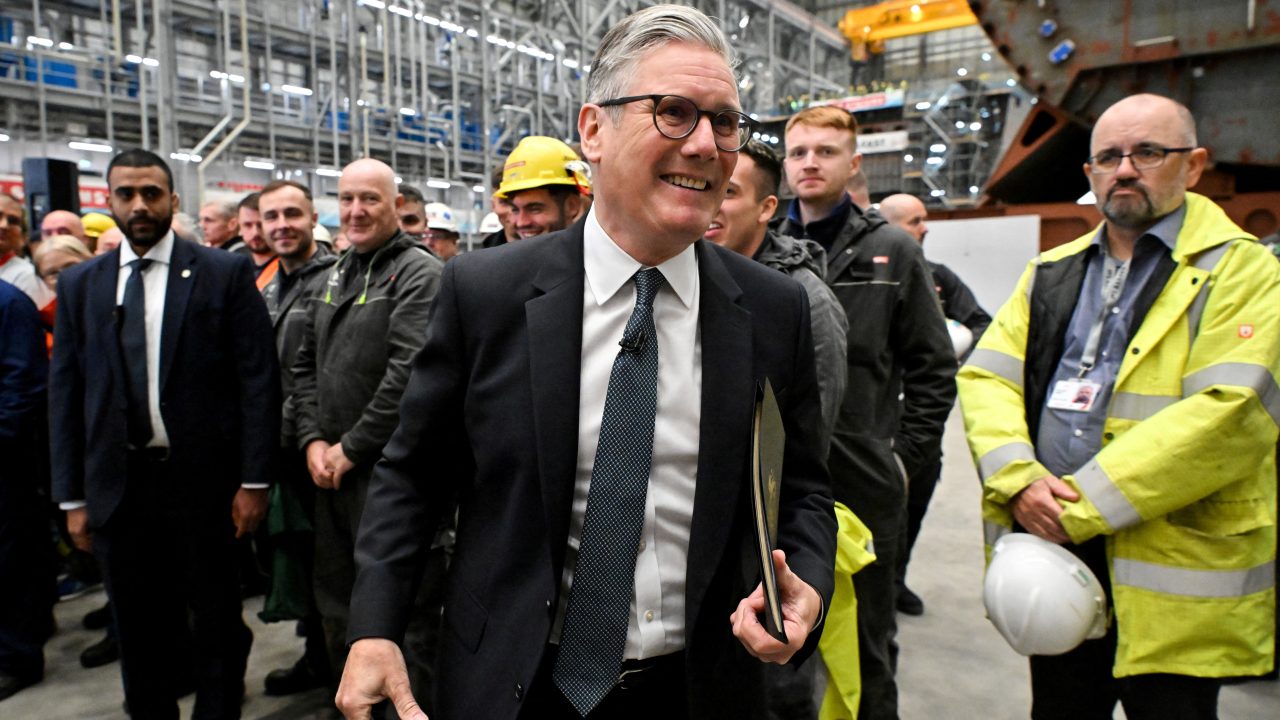 U.K. Prime Minister Keir Starmer leaves the stage after delivering a speech at BAE Systems’ Govan facility in Glasgow on June 2. (Photo: Andy Buchanan/Pool via Reuters)