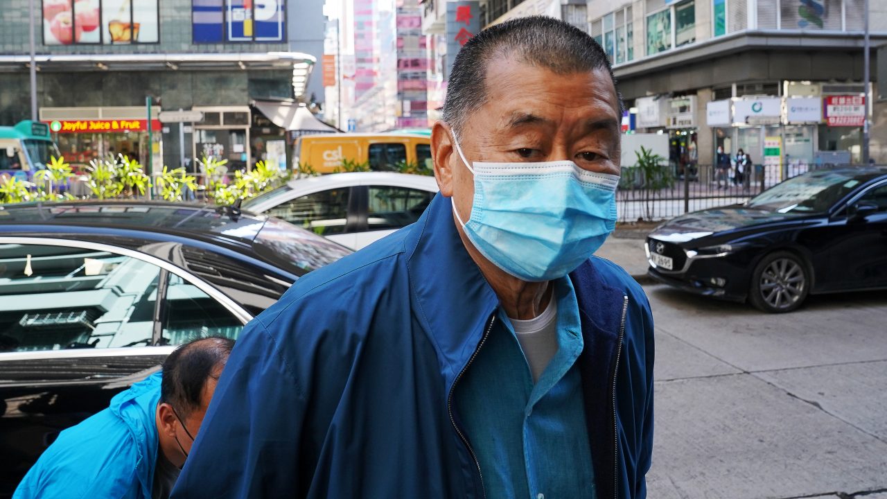 Media mogul Jimmy Lai Chee ying founder of Apple Daily reports to the police station after he was released on bail following his arrest under the national security law in Hong Kong